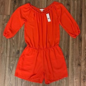 SOLD *NWT* NYC Orange Romper size XS